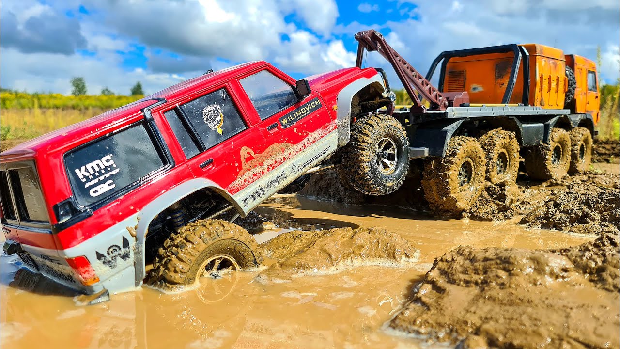 RC КАМАЗ 8х8 спасает застрявшией Nissan Patrol смотреть онлайн