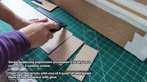 Из картона и пеноплекса сделала чудесный камин. Как по мне: от настоящего не отличить