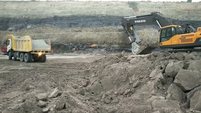 Volvo EC480DL Excavator Loading Scania Tipper Trucks