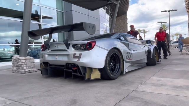 Ferrari 488 GT Modificata - Start up, revs, parking into showroom смотреть онлайн