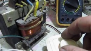 Диммер  в первичной цепи трансформатора.