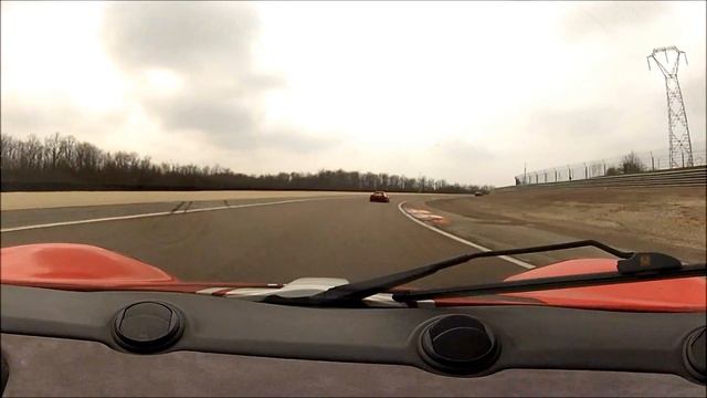 Lotus Elise R (road tires) chasing a 308 Gr IV race car (semi slick tires) at Dijon Prenois track смотреть онлайн