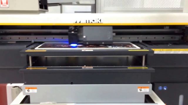Mimaki UJF-6042 Printing In Action At Mimaki USA. Colors Have Never Been So Wonderfully Printed.