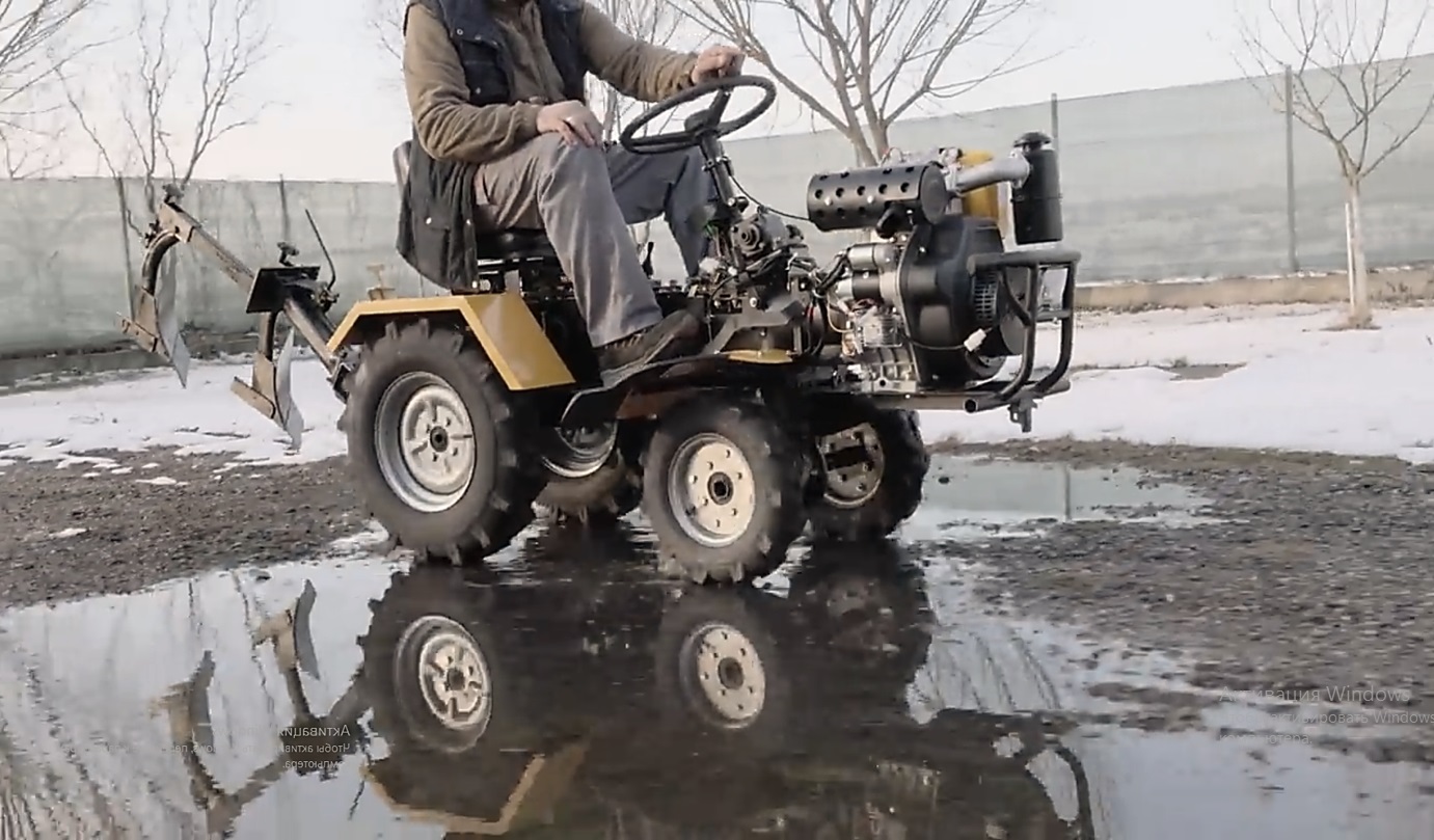 Помощник в хозяйстве. Мини-трактор 4х4 с дизельным мотором смотреть онлайн
