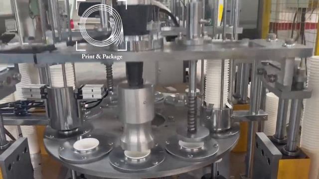 Оборудование для расплющивания закругленной поверхности стаканов для последующей приварки фольги смотреть онлайн