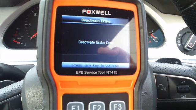 Electronic Parking Brake (EPB) Servicing on an Audi A6 with a Foxwell NT415 Tool смотреть онлайн