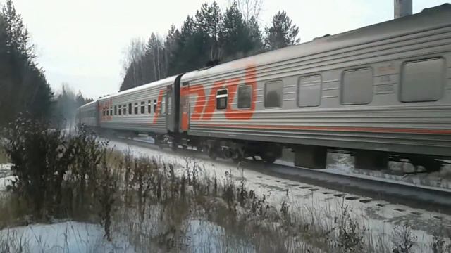 Тепловоз ТЭП70-0034 с пассажирским поездом Приобье - Екатеринбург. смотреть онлайн