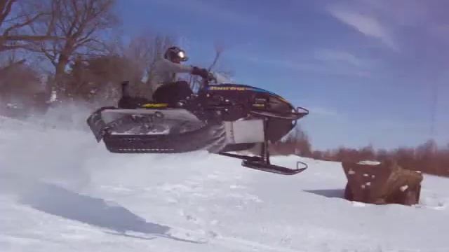 Rotax 440 snowmobile hits a jump and bails смотреть онлайн