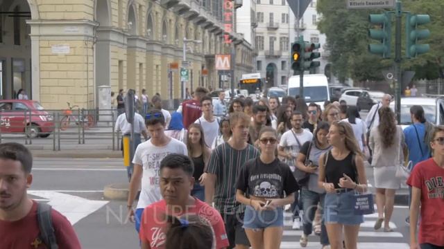 Pedestrians outside Torino Porta Nuova railway station in Turin, Italy, Europe смотреть онлайн