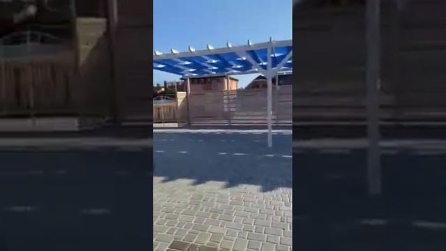 теневой навес из затеняющей сетки для котеджного поселка 