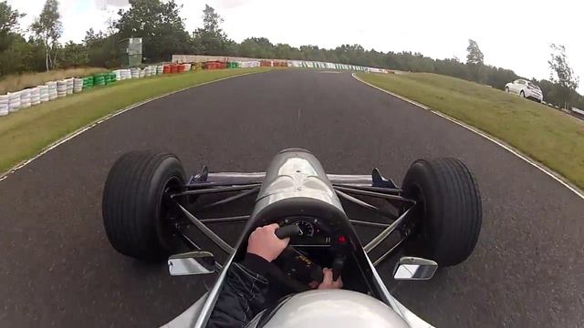 Driving an F1 car around a go-kart track смотреть онлайн