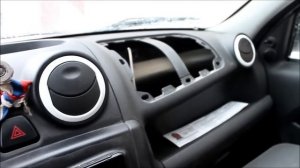 В Garage Тизер: Дополнительный бардачок в гранту  из заглушки от подушки безопасности.