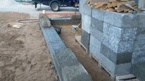 Кладка стены из арболитовых блоков.