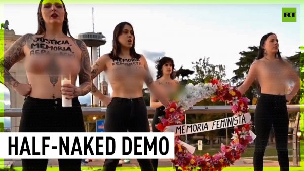 Topless FEMEN activists denounce fascism supporters