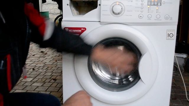 Как открыть люк у стиральной машины LG/