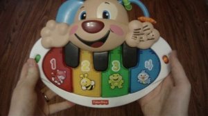 Обзор №1  Развивающая игрушка Пианино Щенок Fisher Price русская версия