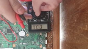 Как проверить батарейку bios мультиметром? (cmos)?