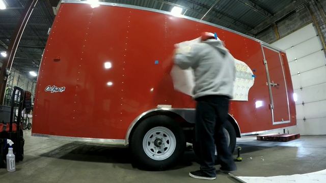 Installing vinyl graphics onto a landscaping trailer. смотреть онлайн
