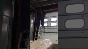 Регулировка секционных ворот, натяжка пружины