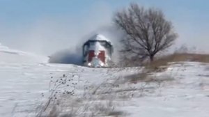 Так поезда чистят снег в Казазстане