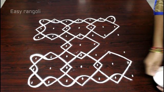 tulasi kota/ design muggulu with 7x7 straight dots || tulasi planter/pot design kolam ||easy rangol смотреть онлайн