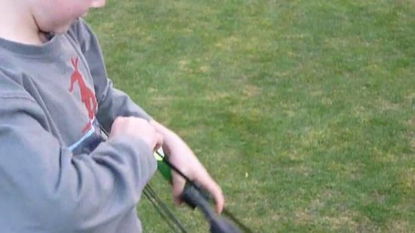 8 Year old boy with 25lb compound bow
