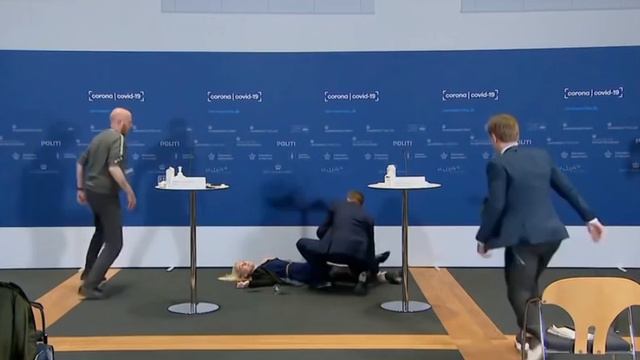 Denmark official Tanja Erichsen faints during a Covid conference смотреть онлайн