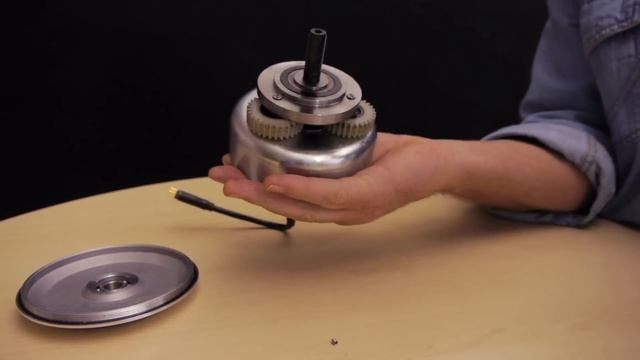 The inside of an e-bike hub motor, with planetary gears. смотреть онлайн