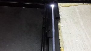 Самый простой способ вырезать гаражную калитку и сделать прижимной запор на ворота.