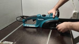 Makita UC3520A электрическая цепная пила.