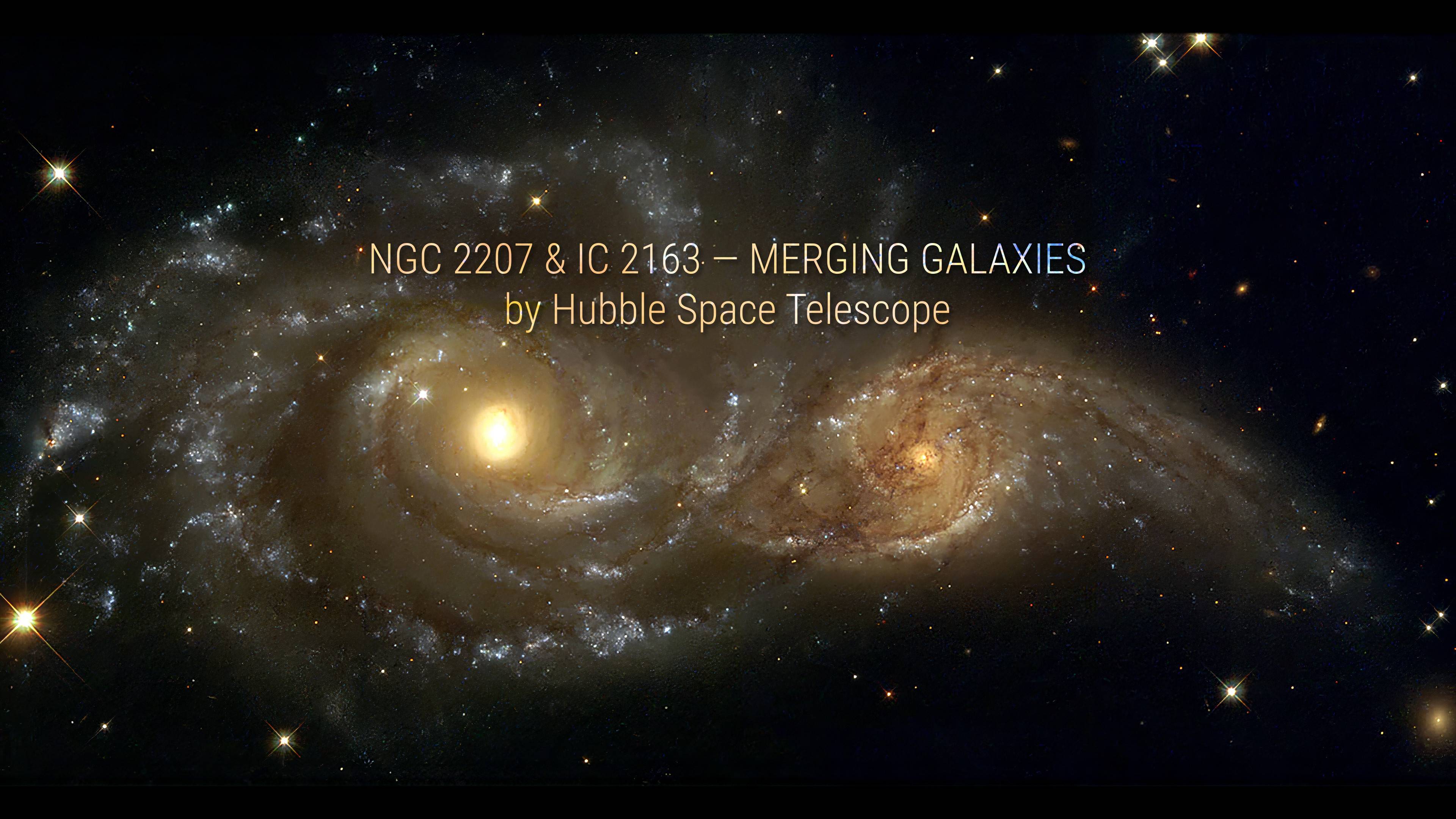 Сливающиеся галактики NGC 2207 and IC 2163. Телескоп Hubble смотреть онлайн