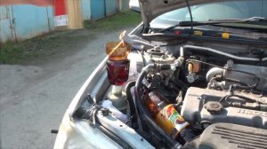 Замена жидкости в ГУР на примере Мазда Фамилия/323