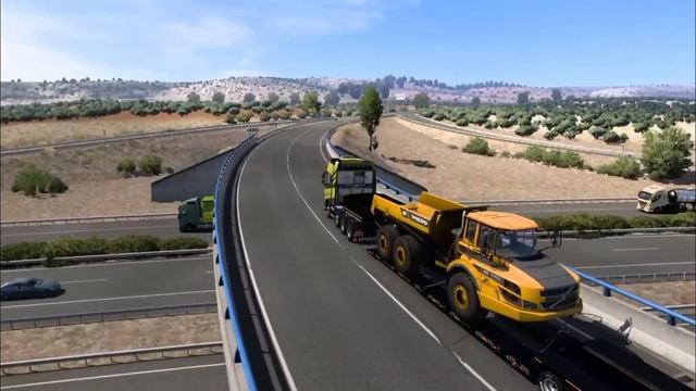 ETS.2 VOLVO FH16 750 Loaded {Articlated Hauler Volvo A25G(25t)} From a City Seville TO Ciudad Real смотреть онлайн