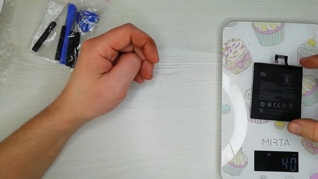 Где купить аккумуляторную батарею для своего смартфона? Распаковка батареи для Mi5C. смотреть онлайн