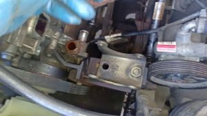 Корпус термостата и насос ГУР - снятие для замены патрубков системы охлаждения УАЗ патриот ЗМЗ409.0