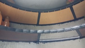 Полки, в подвале из бетонных колец.