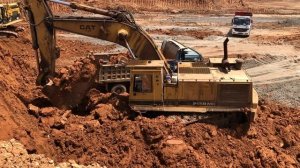Caterpillar 245 Excavator Loading Mercedes And MAN Trucks