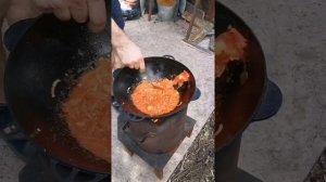 Солянка сборная мясная с копченостями в казане на костре.