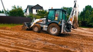 Поднятие уровня участка. Отсыпка пескогрунтом. Выравнивание и планировка участка.