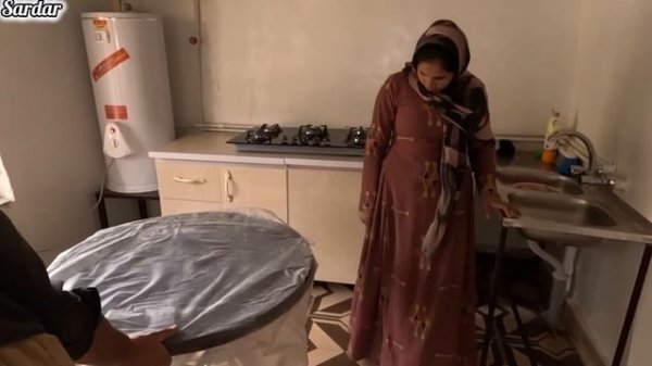 The romantic life of nomadic love: installing a cabinet and giving a gift to the mother