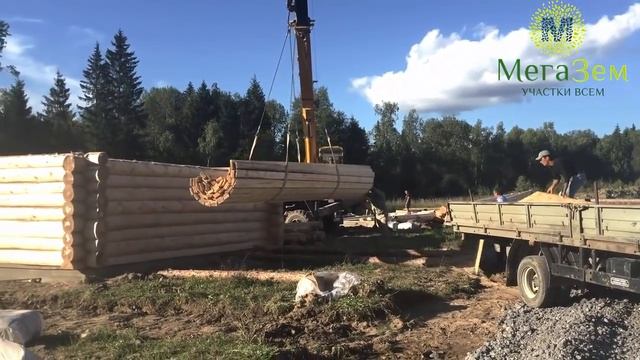 Разгрузка бревен бригадой строителей "МегаЗем". смотреть онлайн