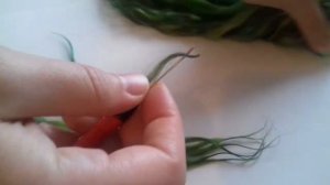 Прошивка кукольной головы шерстью козы.