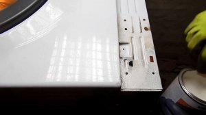 Убрать ржавчину на стиральной машине.