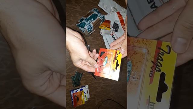 Unboxing воблеров и вращающихся блёсен, плетеной лески, титанового проволока по заказу FMagazin.ru смотреть онлайн
