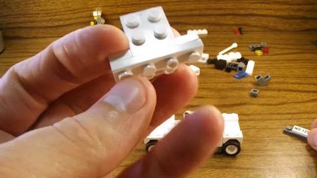 Lego совместимый Enlighten Скорость замеряющая полицейская машина 125 Обзор и сборка конструктора. смотреть онлайн