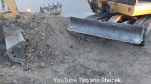 Землеройная техника. Мини экскаватор в работе на небольших территориях со стеснёнными условиями.