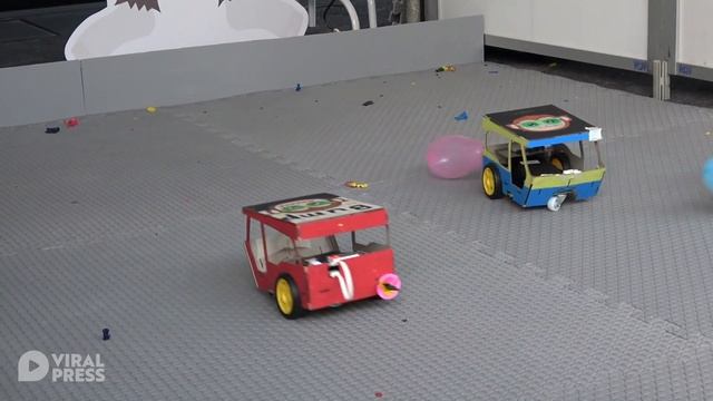 Remote Controlled Bumper Cars Battle With Pins And Balloons смотреть онлайн