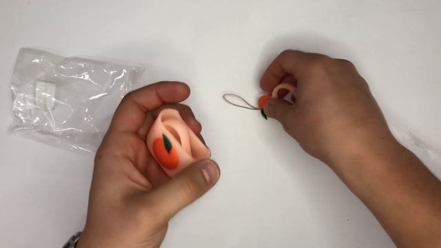 Видео обзор: Чехол для Apple AirPods силиконовый оранжевый с персиком смотреть онлайн