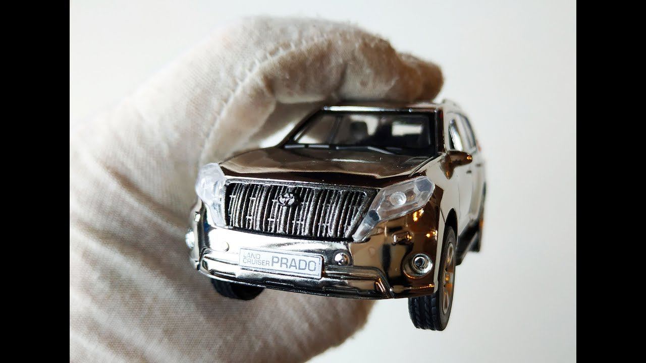 Про МАШИНКИ. Зеркальная моделька Toyota Land Cruiser Prado распаковка и обзор.