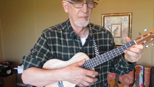 Davis plays Kmise tenor travel ukulele. смотреть онлайн